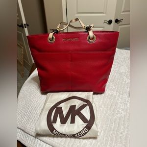 Michel khors purse// red// very clean//
